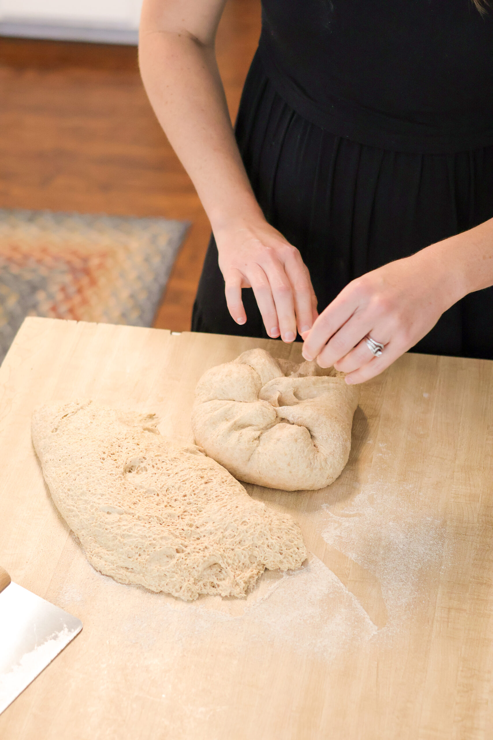 Shaping sourdough loaves on the counter